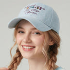 Embroidered cotton baseball cap by Trendsi featuring stylish athletic design and adjustable fit.