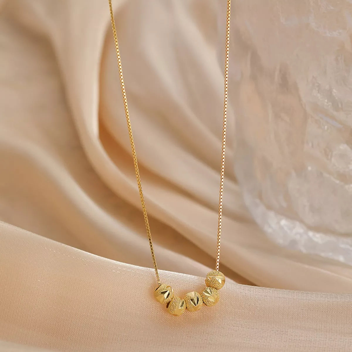 Sterling silver beaded necklace with small round beads, crafted by Shopimist, displayed against a neutral background.