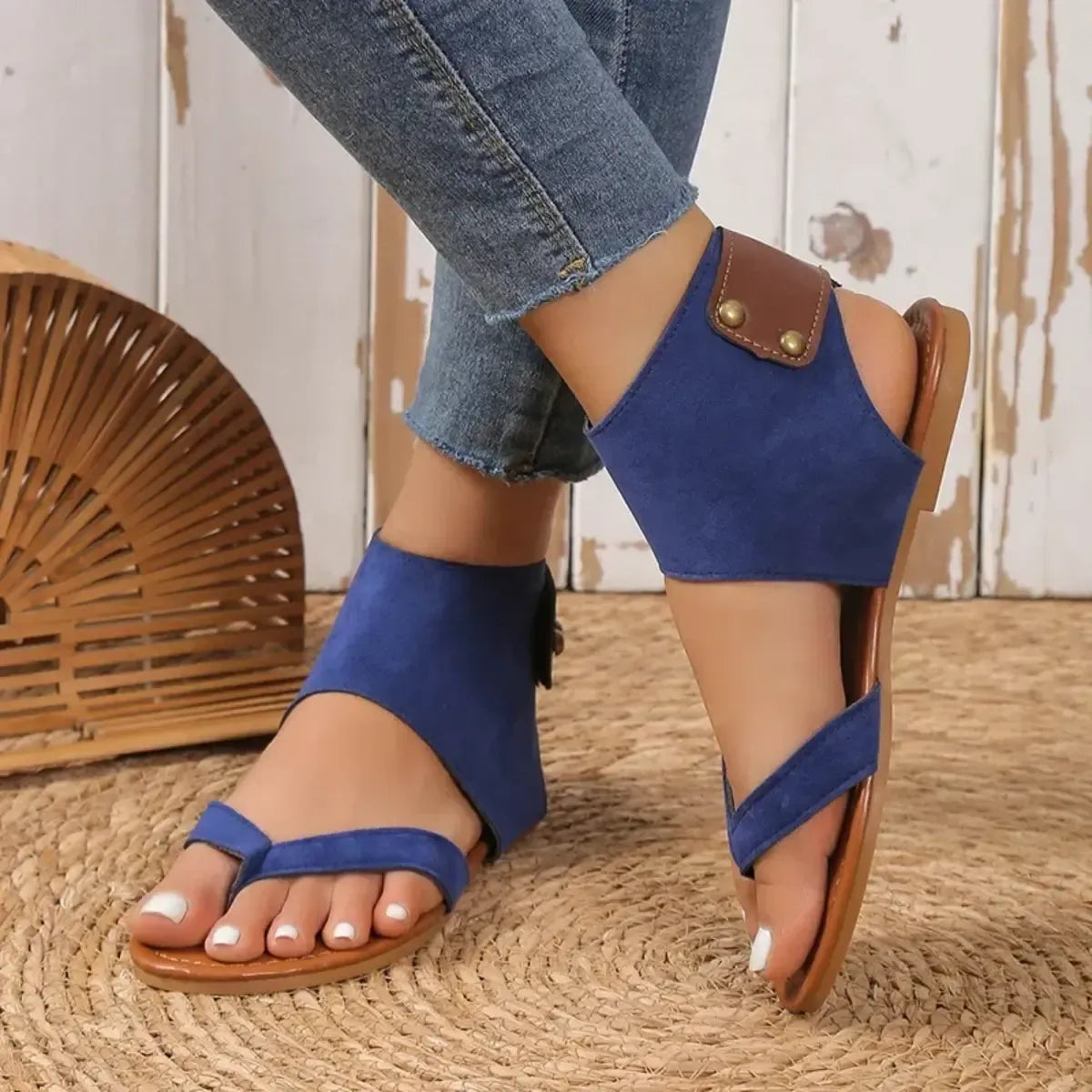 Women's faux leather ankle strap flat sandals by Trendsi, featuring comfortable design and stylish ankle strap detail.