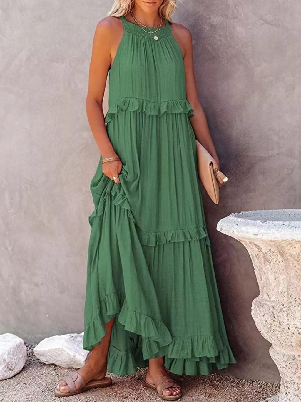 Ruffled tiered sleeveless maxi dress by Plush Fashion Hub, featuring flowing fabric and layered design for elegant summer style.