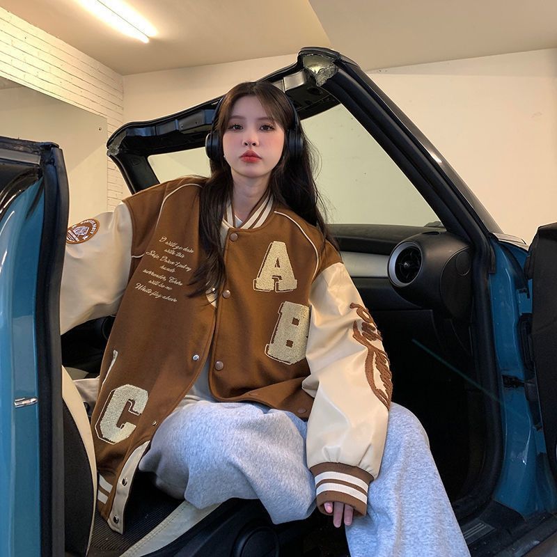 Women’s oversized Y2K lamb-wool bomber jacket by FitiqueFit, streetwear style with plush wool texture and relaxed fit.