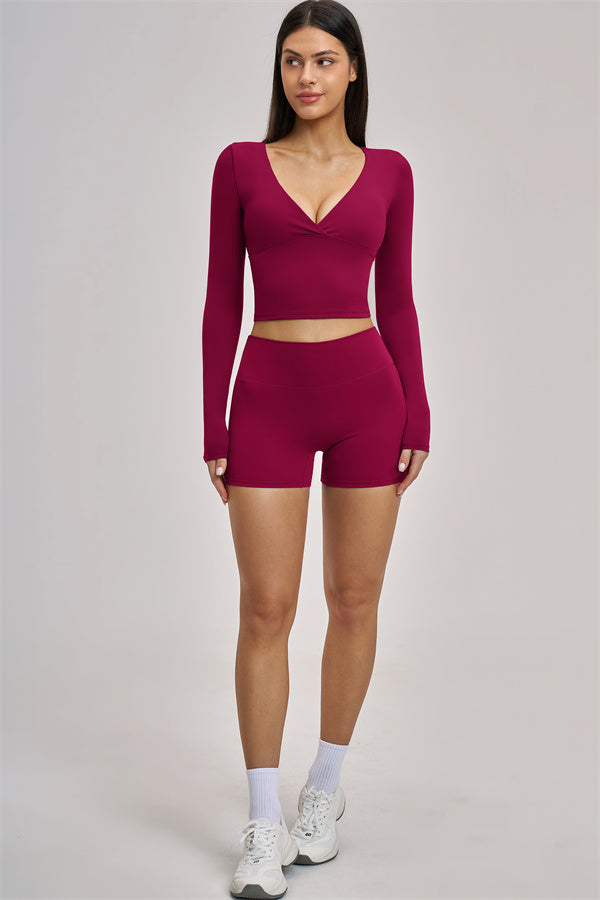 Fitglutes Activewear long sleeve crop top from The Swoon collection, stylish gymwear with a fitted design and sporty look.