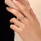 Sterling silver layered ring with a 1-carat moissanite gemstone, showcasing a sparkling, elegant design.