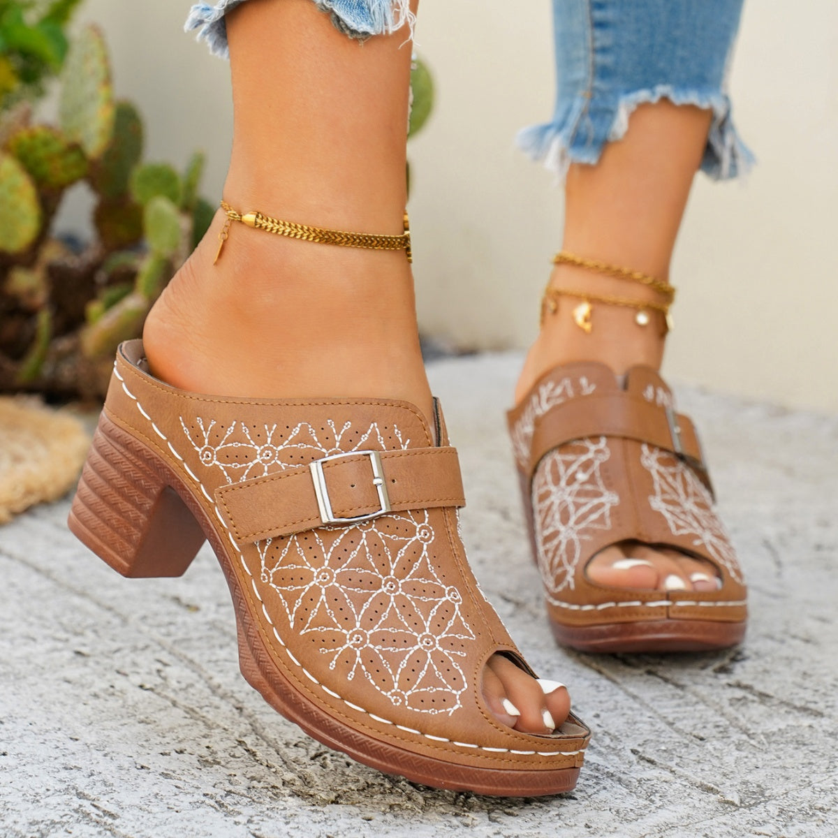 Women's chic buckle detail block heel sandals in premium faux leather, featuring stylish straps and a sturdy heel.