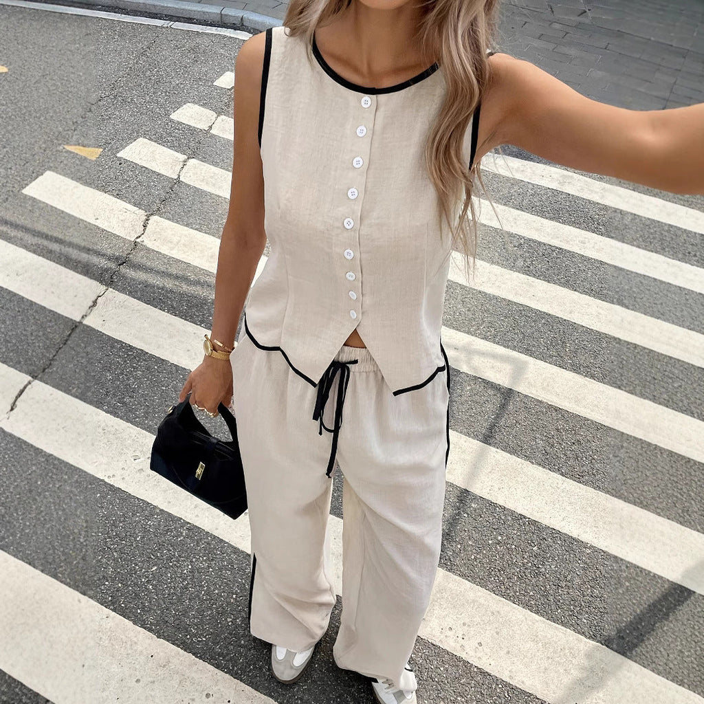 Women's contrast color sleeveless vest and drawstring trousers suit by FitiqueFit, shown in six different colors, available in sizes S to XXL.