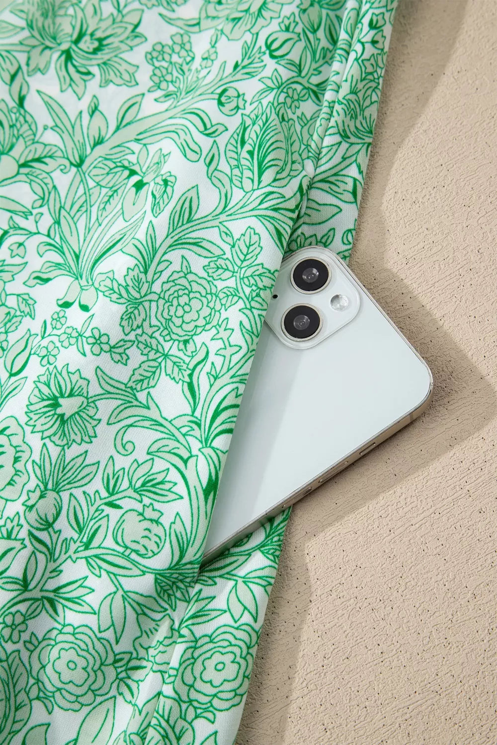 Floral midi dress by Plush Fashion Hub featuring contrast trim, flutter sleeves, and a feminine, flowy design.