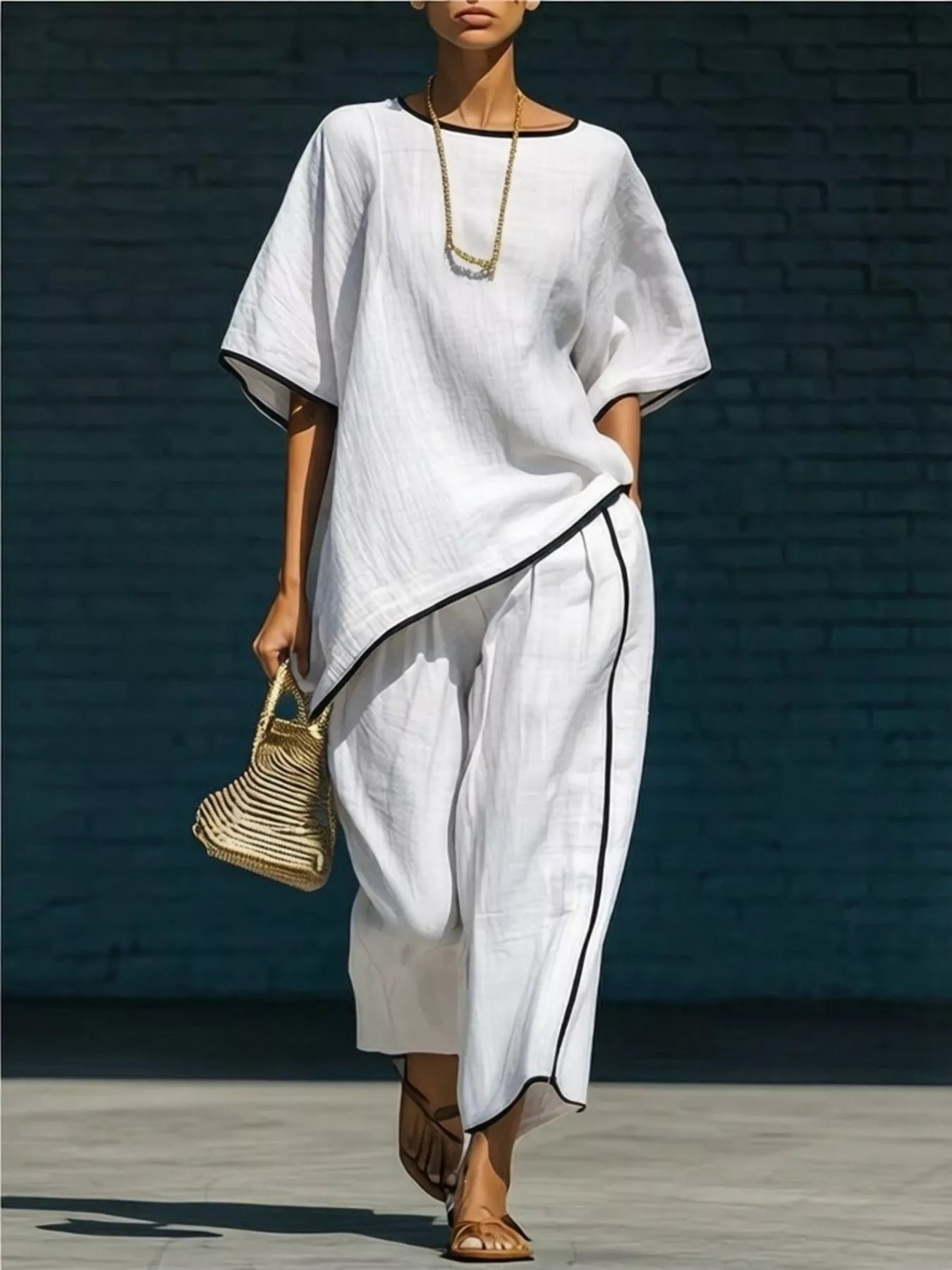 Contrast trim round neck top and pants set by Plush Fashion Hub, featuring a casual, stylish design with coordinating details.