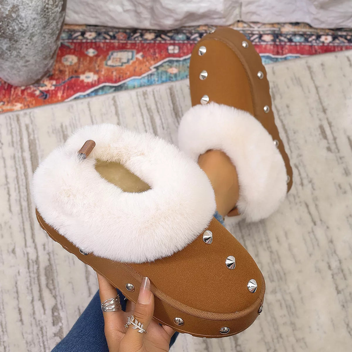Trendsi studded platform faux fur-lined winter boots with rugged soles and decorative studs, perfect for cold weather style.