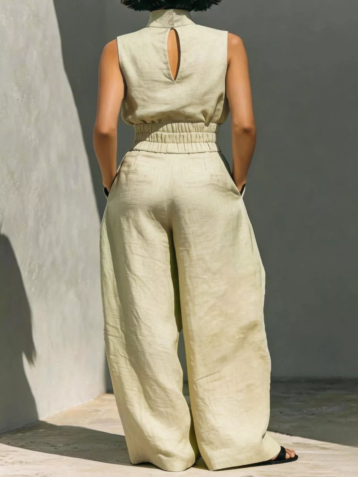 Plush Fashion Hub sleeveless turtleneck top and wide-leg pants set in soft plush fabric, styled with neutral tones.
