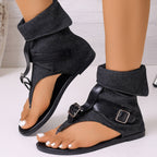 Shopimist toe post buckle sandals with leather straps and metal buckles, shown on a model's foot.