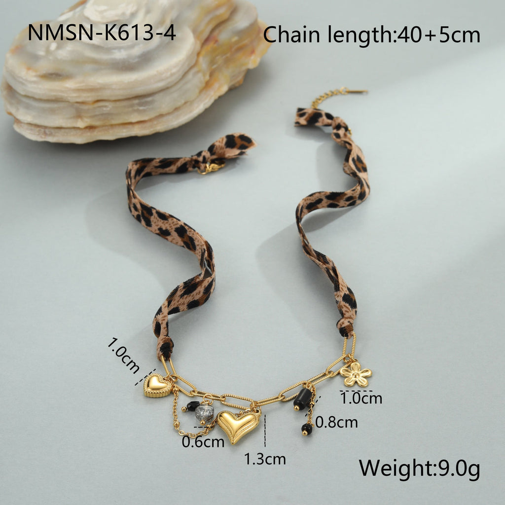 Leopard Series Love Sun Pendant made of stainless steel, featuring a sun and leopard design, from Plush Fashion Hub.
