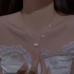 Sterling silver zircon butterfly necklace with delicate chain, featuring a sparkling butterfly pendant, designed by Shopimist.