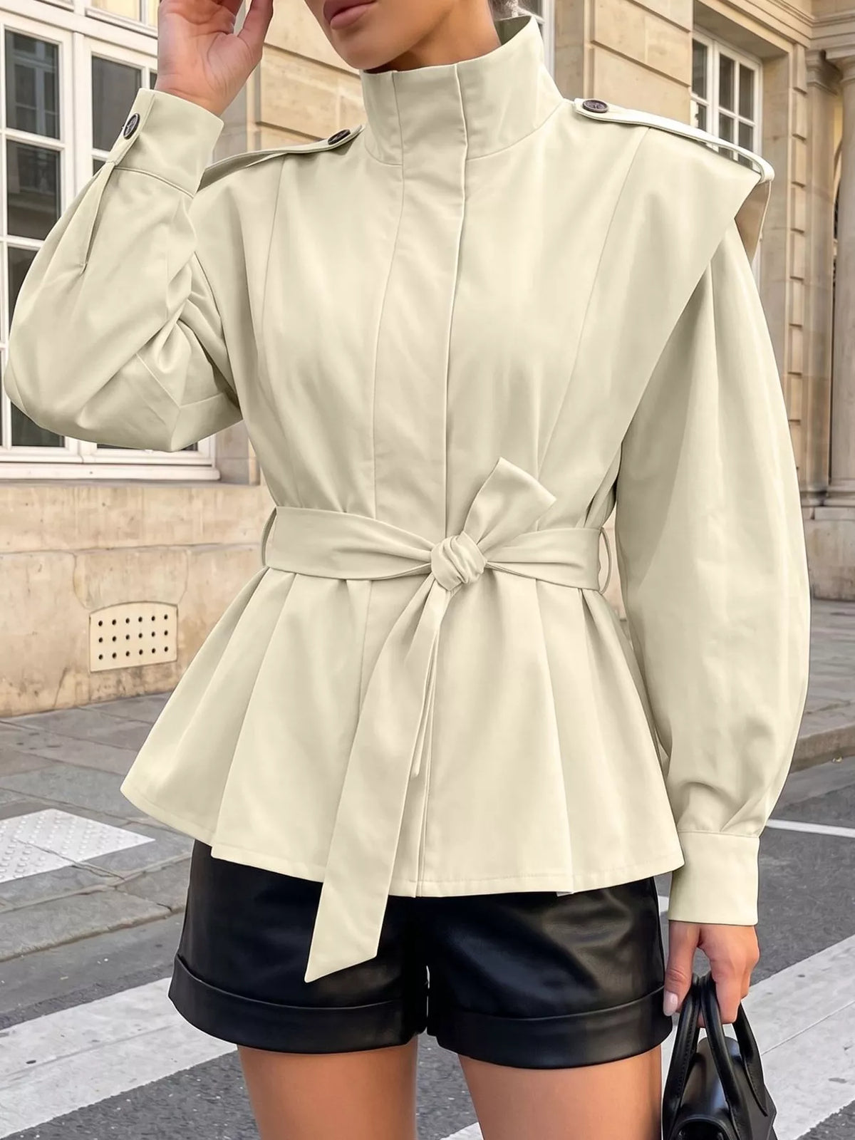 Trendsi stand-collar belted outerwear with front pockets, stylish and warm for fall and winter wear.