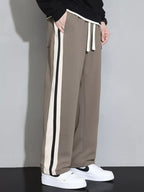Men's plus size casual loose pants with side stripes, comfortable and stylish, from Shopimist.