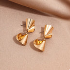 18K gold-plated twist earrings with a sleek, modern design, featuring smooth, intertwined metal curves for elegant style
