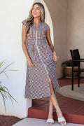 Threaded Pear Sarahi Flare Sleeveless Maxi Dress displayed on a hanger with flowing fabric and vibrant pattern.