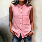 Women's sleeveless crop top by FitiqueFit featuring buttoned pockets in a solid color, perfect for casualwear.