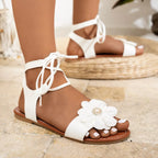 Open toe flower sandals by Shopimist featuring colorful floral accents and comfortable sole, perfect for warm-weather wear.