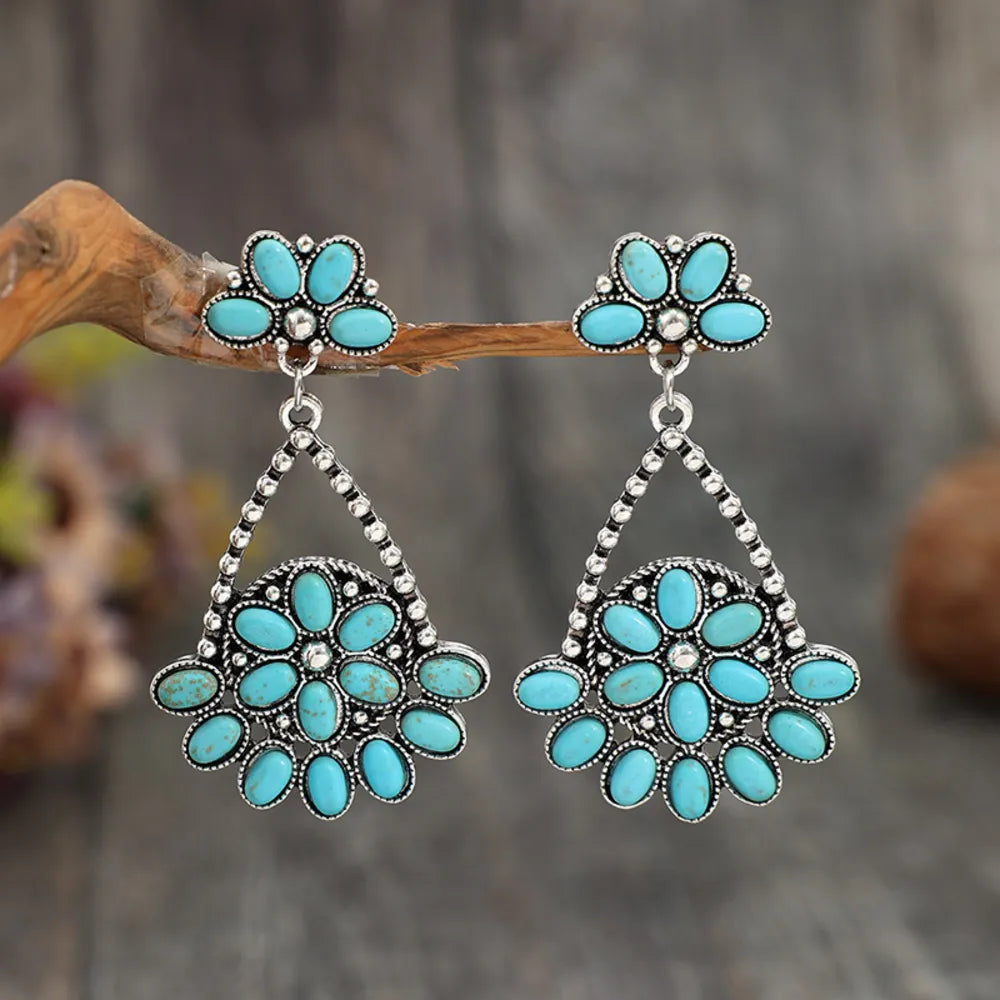 Artificial turquoise teardrop earrings from Plush Fashion Hub featuring vibrant blue-green stones and elegant dangle design.