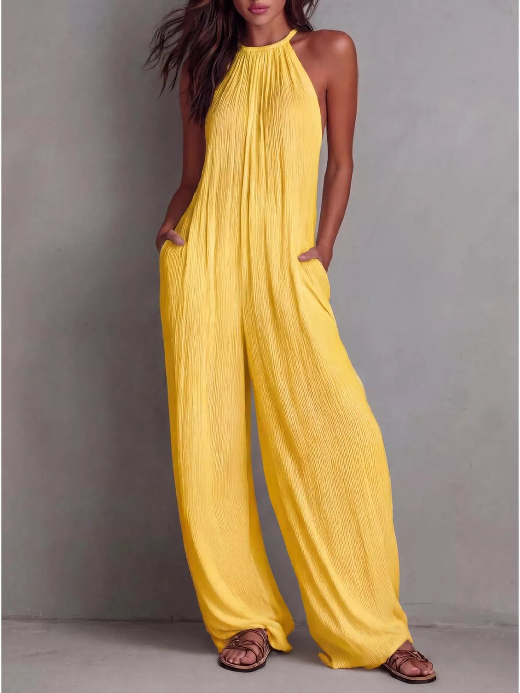 Shopimist sleeveless wide-leg jumpsuit with a relaxed fit, featuring a stylish, flowing silhouette and modern design.