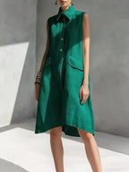 Plus size sleeveless button front dress by Shopimist, full-length with a flattering fit and stylish design.