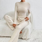 Women’s ribbed V-neck top and pants set by FitiqueFit, featuring a casual, comfortable fit in soft fabric.