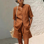 Women's cotton-linen loose-fit T-shirt and cropped shorts two-piece casualwear set by FitiqueFit, shown on a model outdoors.