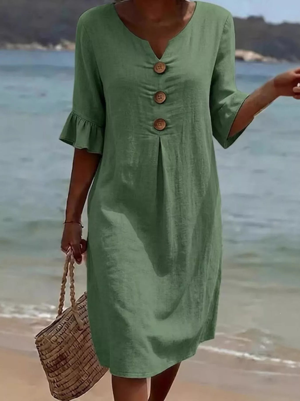Plus size midi dress with button decor, ruffle sleeves, in a full size, featuring trendy design and elegant style.