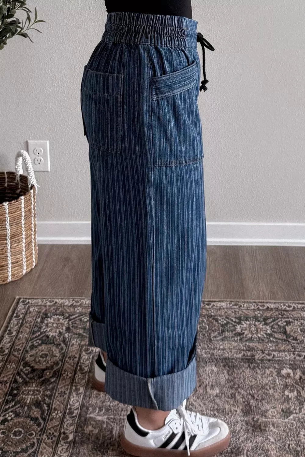 Striped wide-leg denim jeans from Plush Fashion Shop featuring a relaxed fit and bold striped pattern.