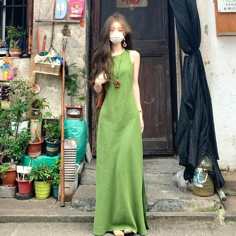 French Green sleeveless vest dress by Plush Fashion Hub, shown on a hanger with a fitted silhouette and classic neckline.