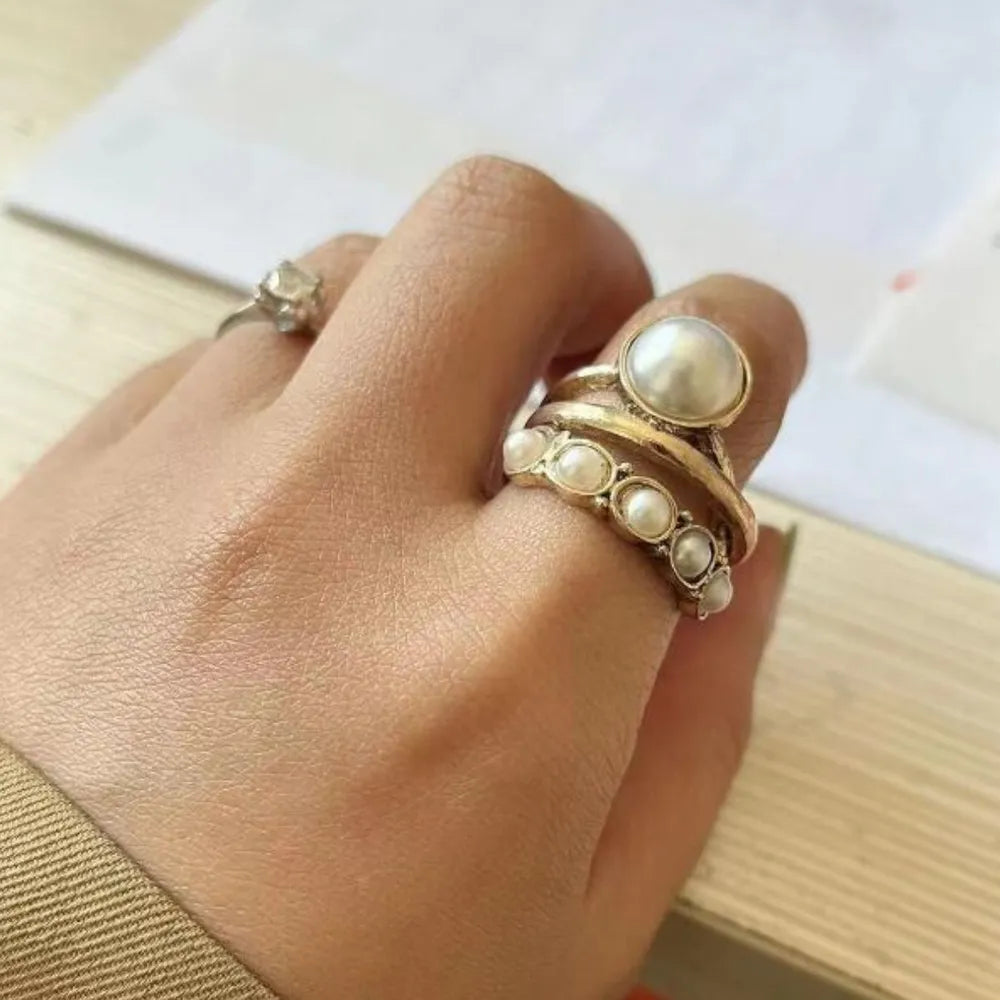 Three-layered alloy open ring from Shopimist with a modern, minimalist design, featuring sleek, interconnected bands.