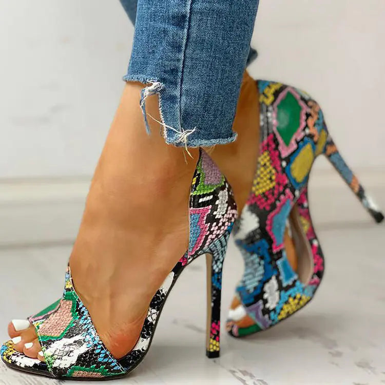 Women’s floral peep-toe high heels by Trendy Attic Store01, stylish women’s shoes with a floral design and open toe.