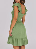 Women's lightweight smocked ruffle hem mini dress by Trendsi, casual summer dress with a breezy, relaxed fit and ruffle details.