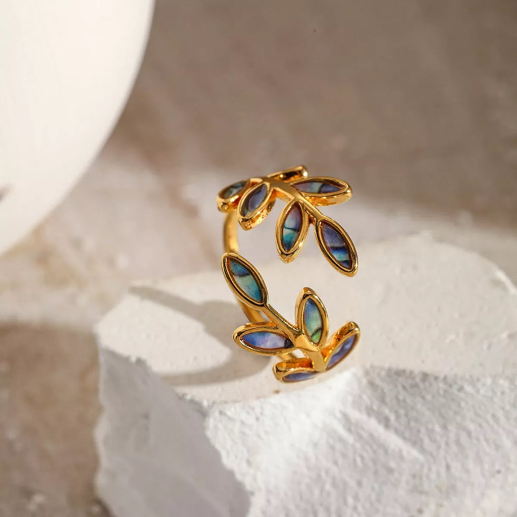 18K gold-plated resin leaf bypass ring with intricate leaf design, stylish jewelry accessory for women.