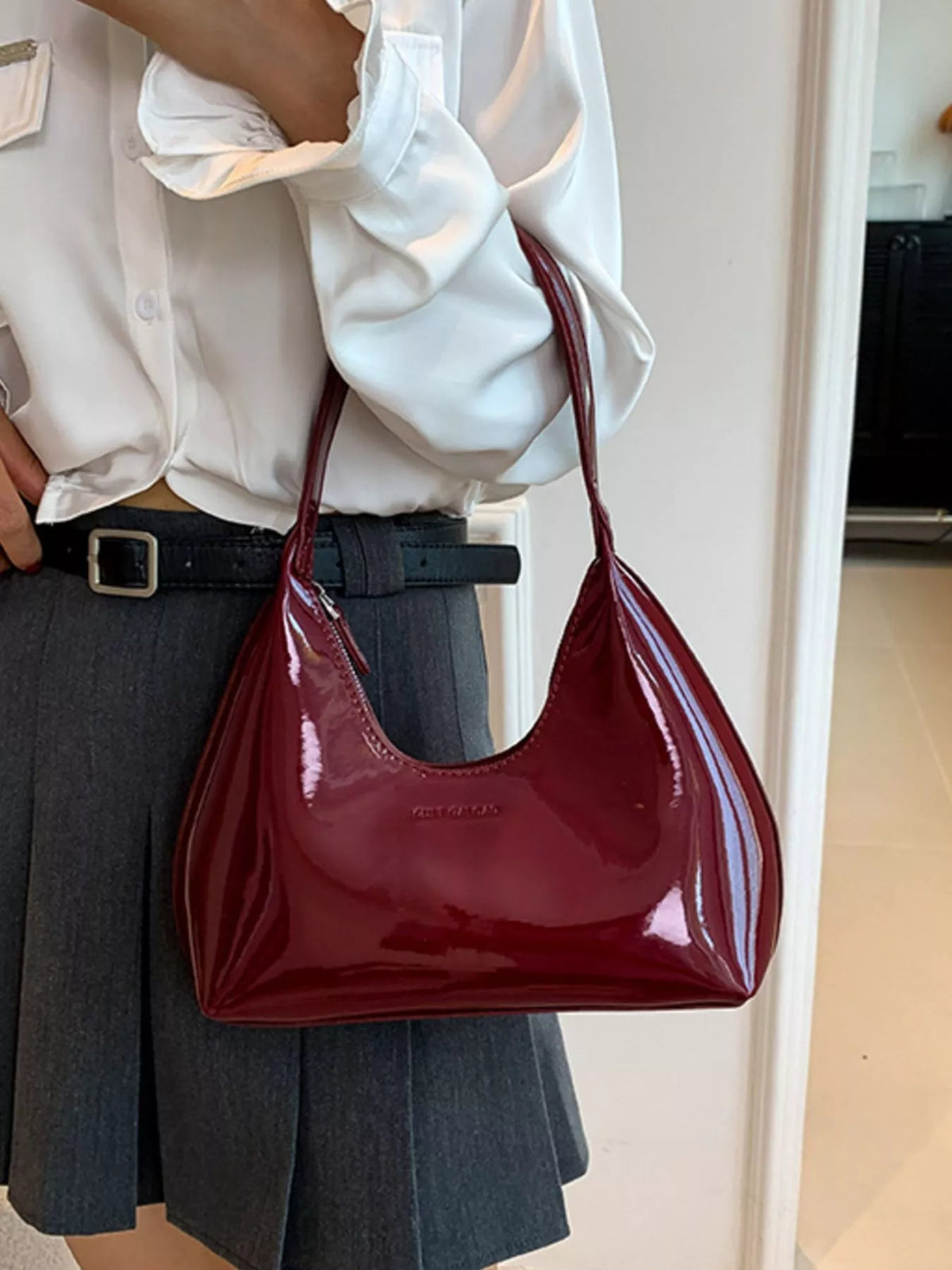Trendsi PU leather shoulder handbag with sleek design, featuring a spacious interior and stylish strap for everyday use.
