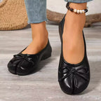 Trendsi bow decor split toe slip-on shoes featuring a stylish design and comfortable fit, shown from a side angle.