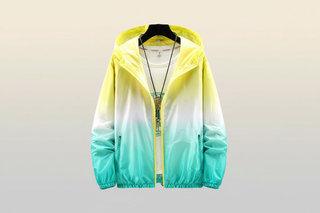 Lightweight FitiqueFit hooded sun-protective jacket with a zipper front and adjustable drawstrings, designed for outdoor sun protection.