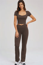 Fitglutes activewear Sizzle T-shirt and flared leggings 2-piece set, black workout clothes with fitted T-shirt and stylish flared leggings.