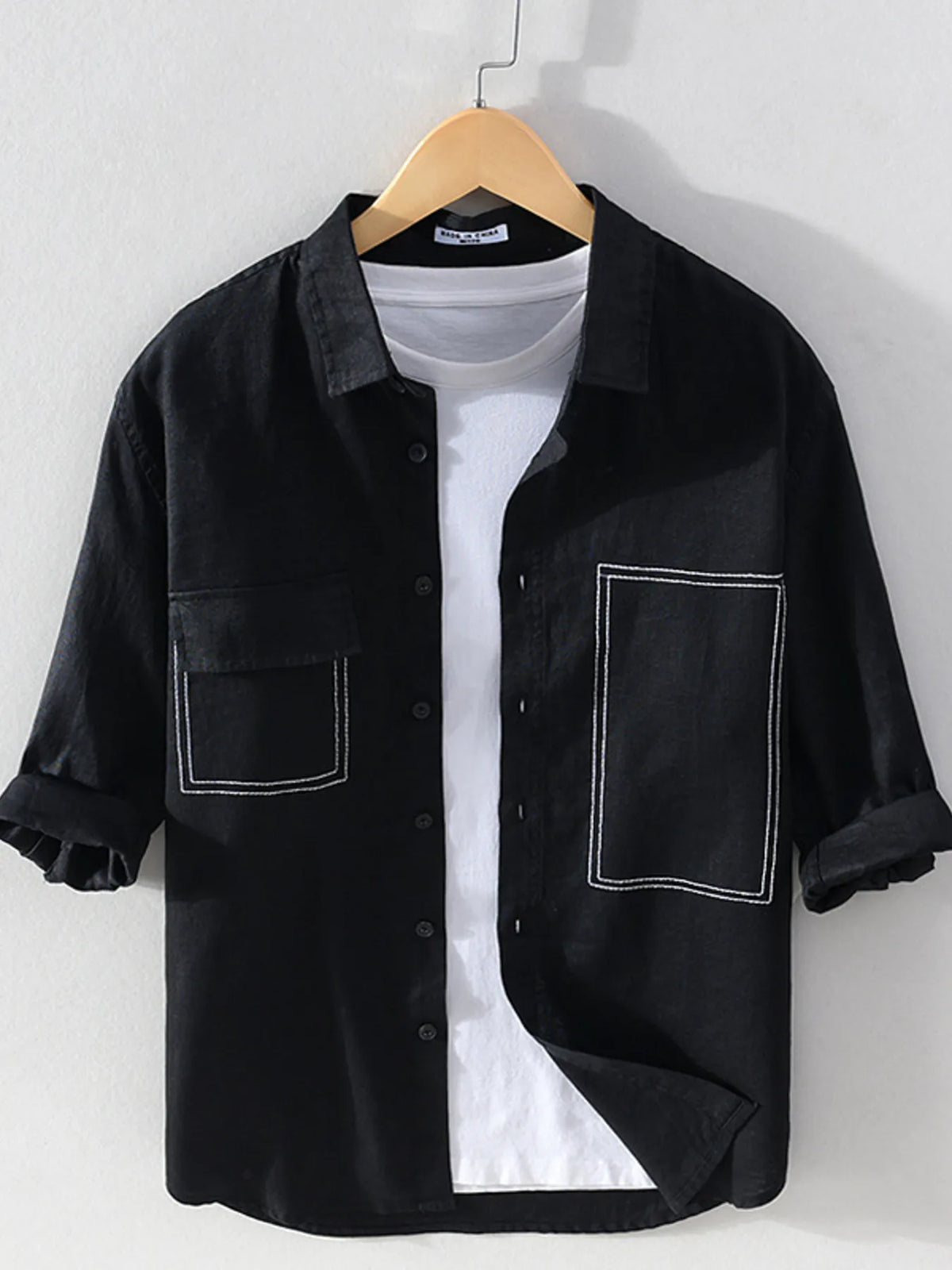 Men's plus size button-up shirt with chest pockets, featuring a casual style from Trendsi.