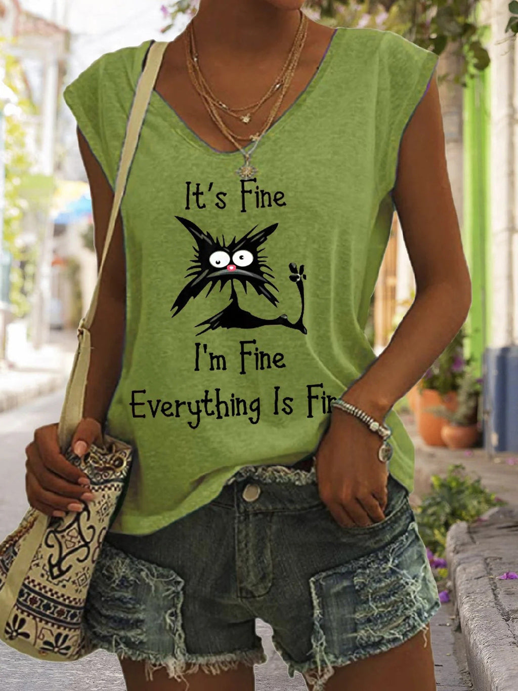 Women's V-neck printed short sleeve loose fit T-shirt by FitiqueFit in various colors, featuring a casual V-neck design and relaxed fit.