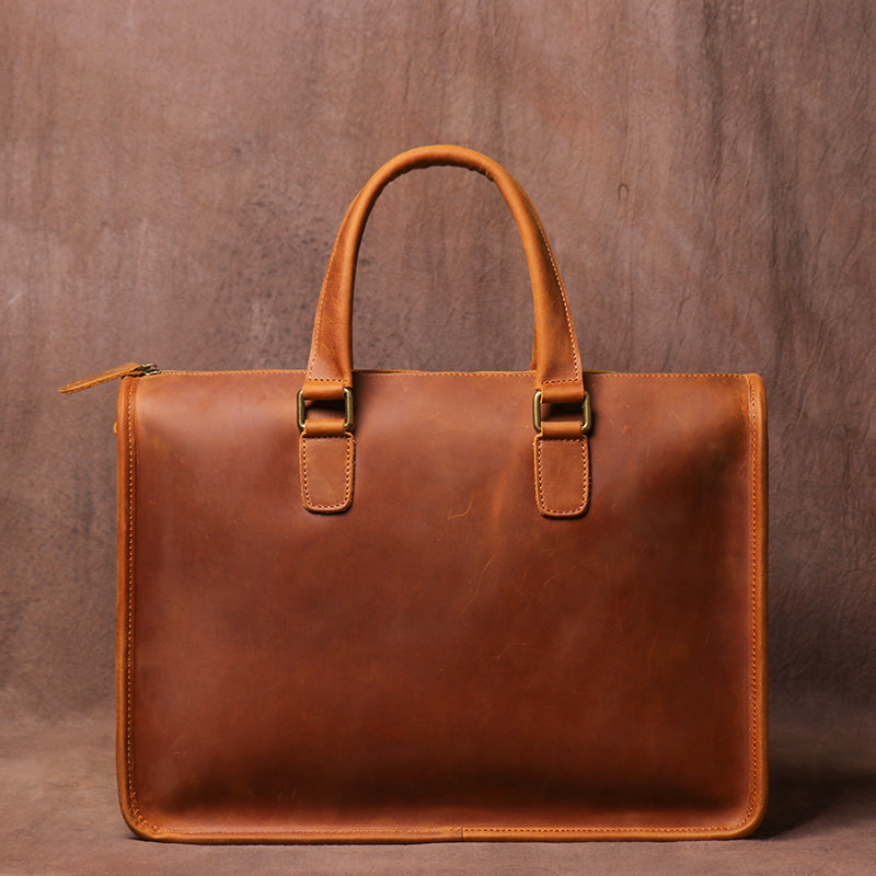 Men's Crazy Horse leather briefcase by Plush Fashion Hub with a sturdy handle and sleek design for carrying laptops.