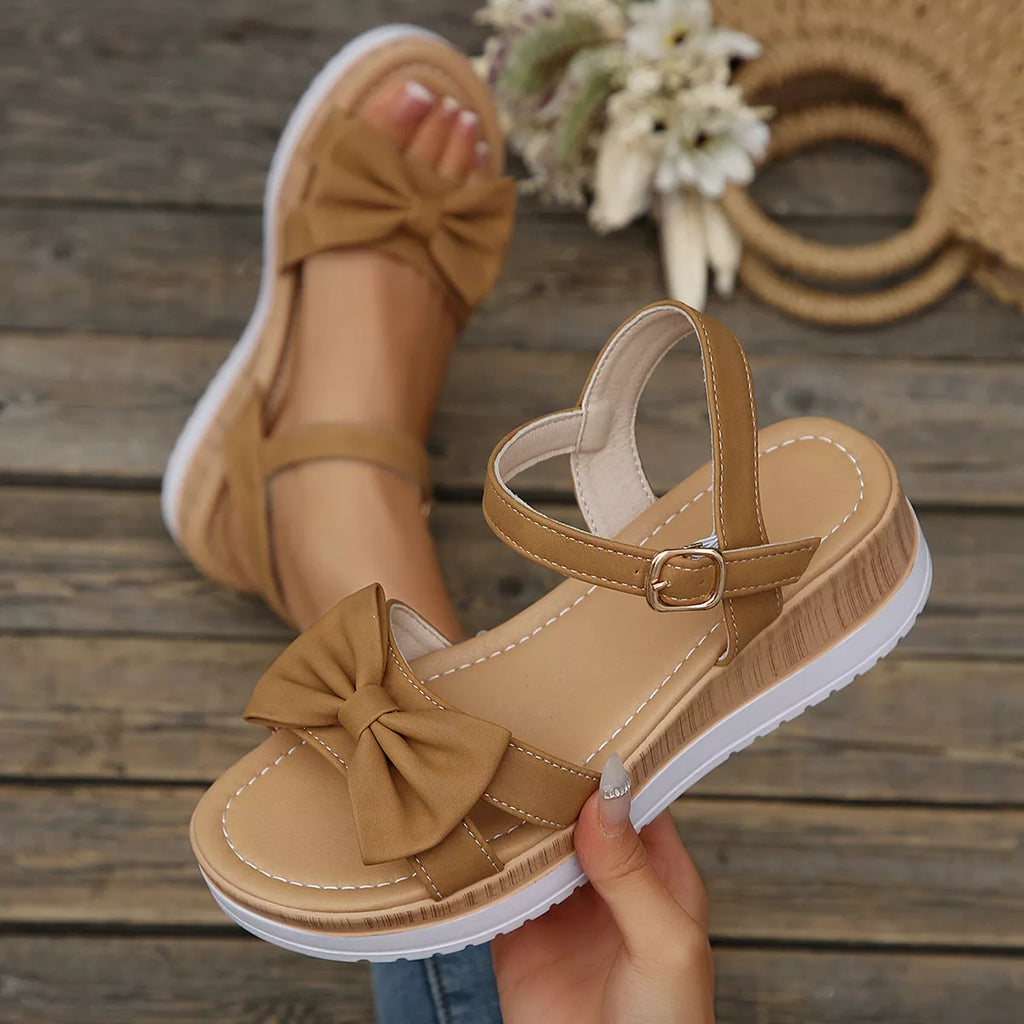 Shopimist open toe wedge sandals featuring a stylish design with a comfortable cork wedge and adjustable ankle strap.