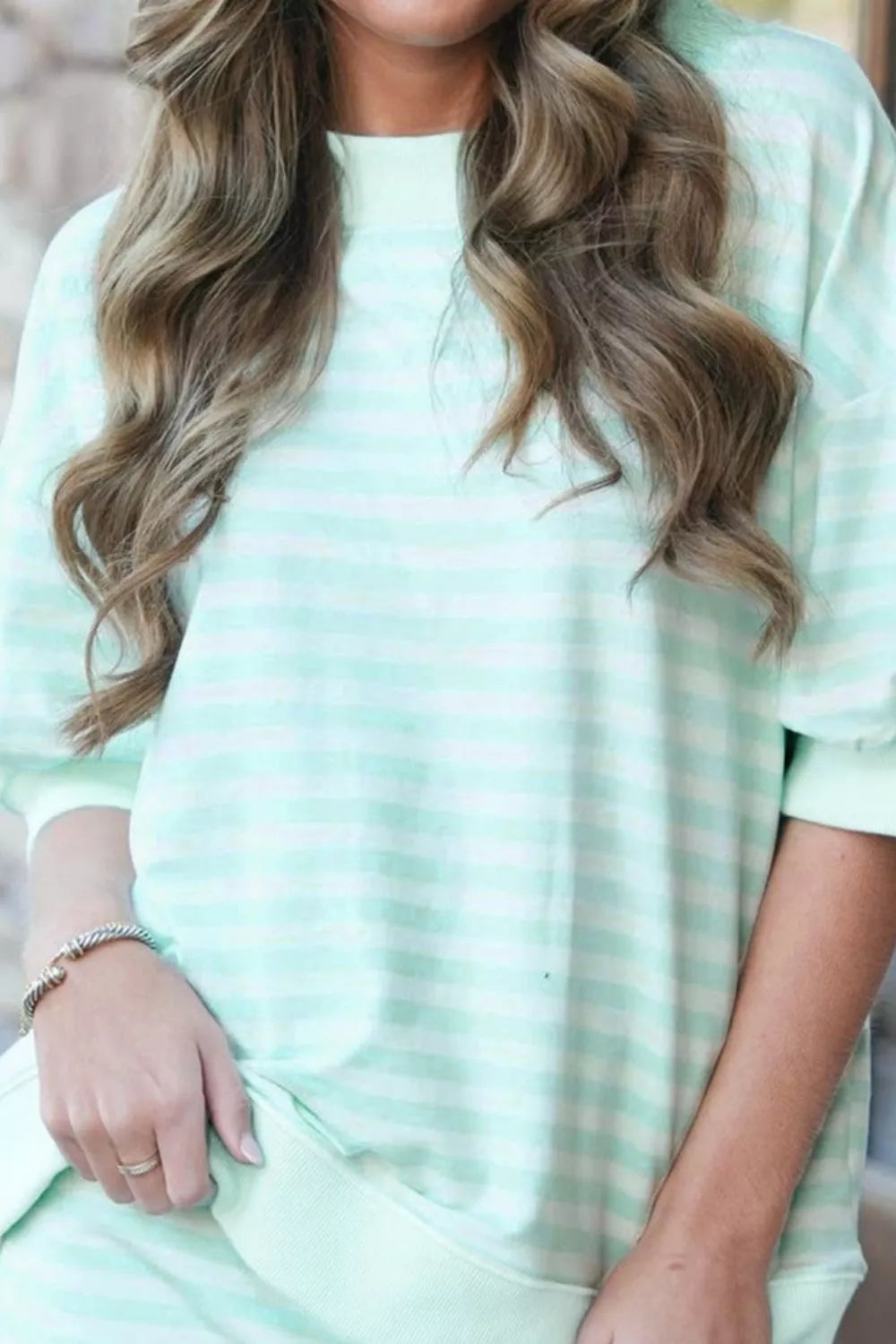 Striped round neck top and skirt set by Plush Fashion Hub, featuring a coordinated matching design and casual style.