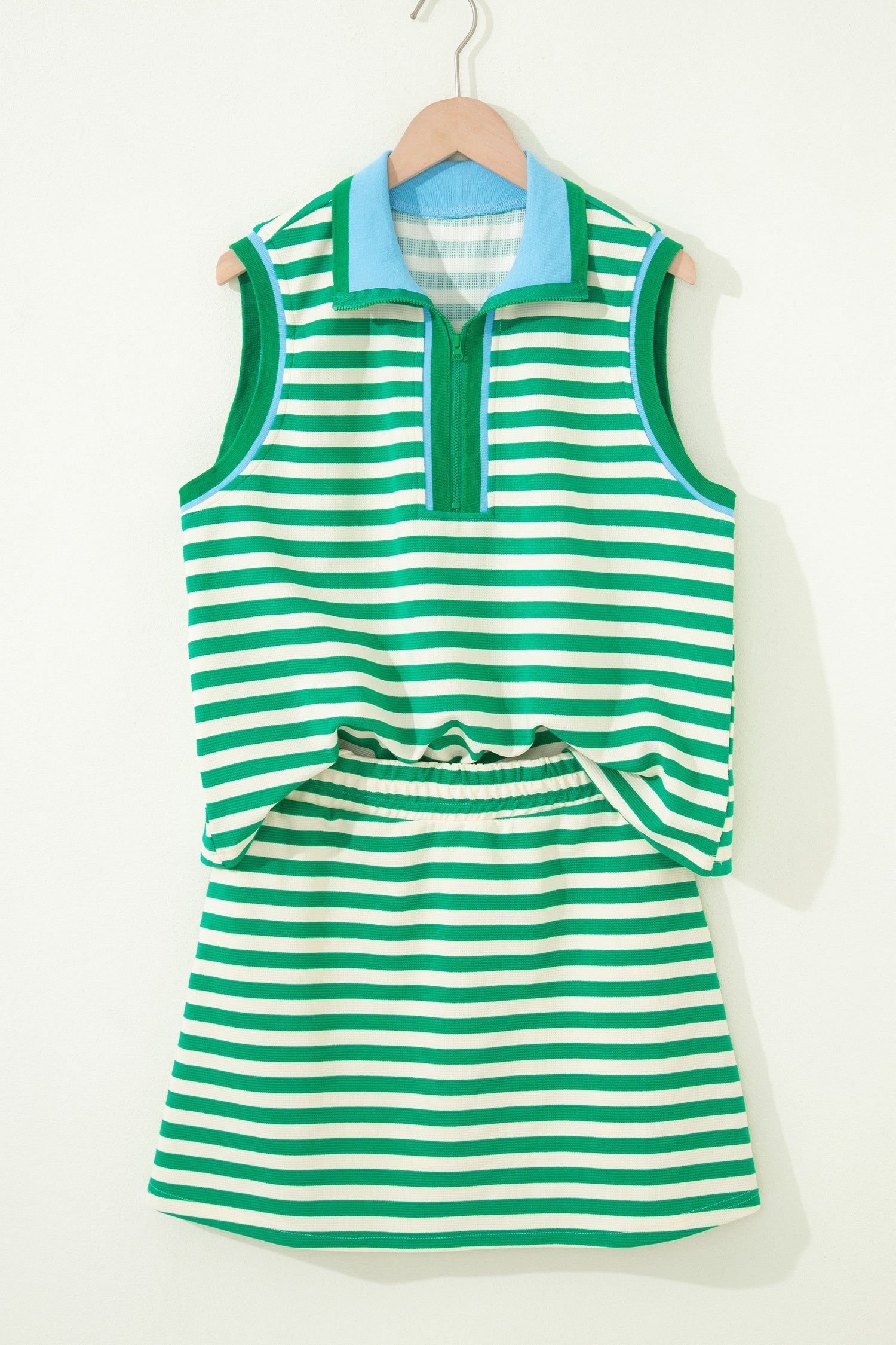 Threaded Pear Ruth sleeveless 2-piece skort set featuring a stylish top and matching skirt for a casual summer look.