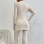 Women's ribbed V-neck top and pants set in casualwear style from FitiqueFit, shown in a relaxed, comfortable fit.