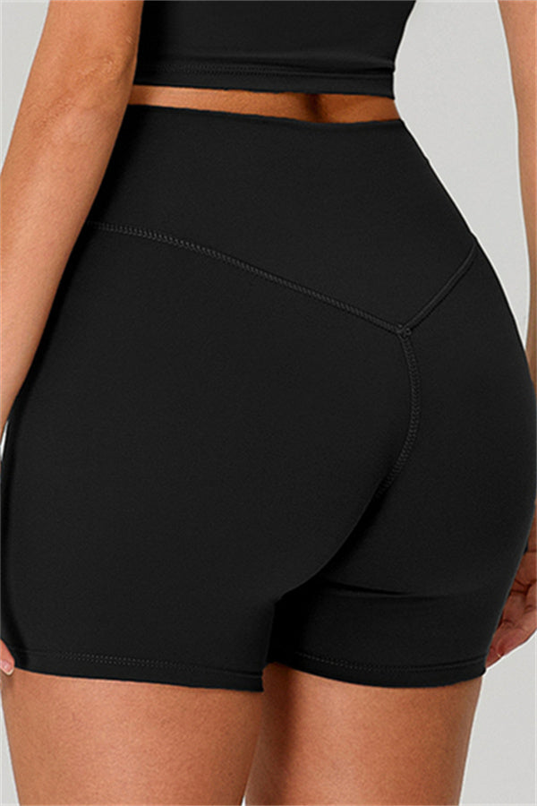 Fitglutes activewear one-shoulder crop top and shorts 2-piece set, stylish gymwear and workout clothes for women.
