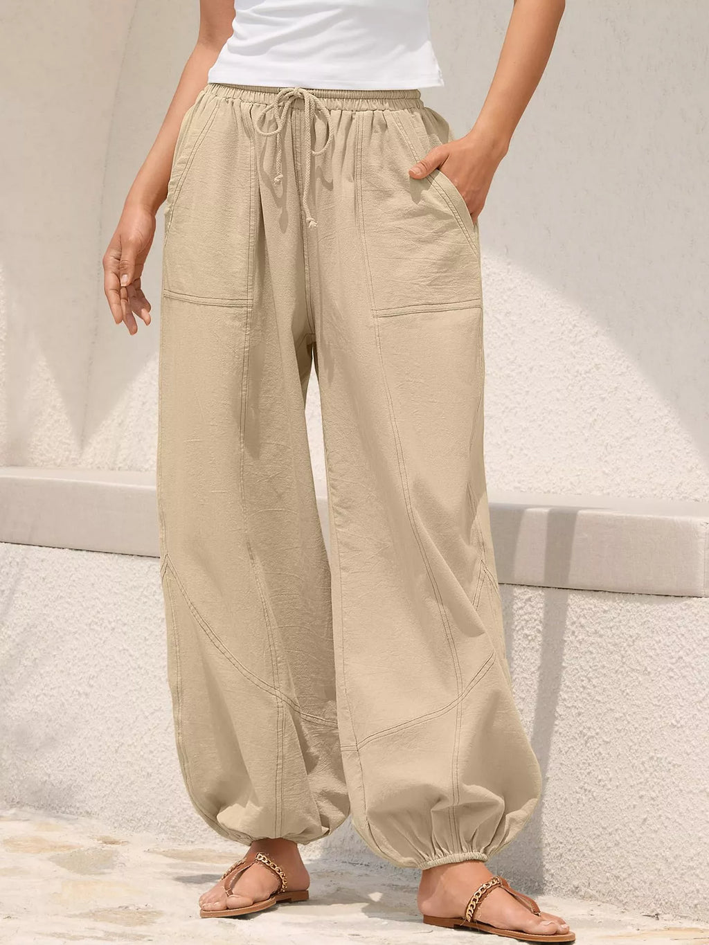 Casual loose-fit drawstring waist harem joggers by Trendsi, featuring relaxed fit and comfortable style, shown in the image.