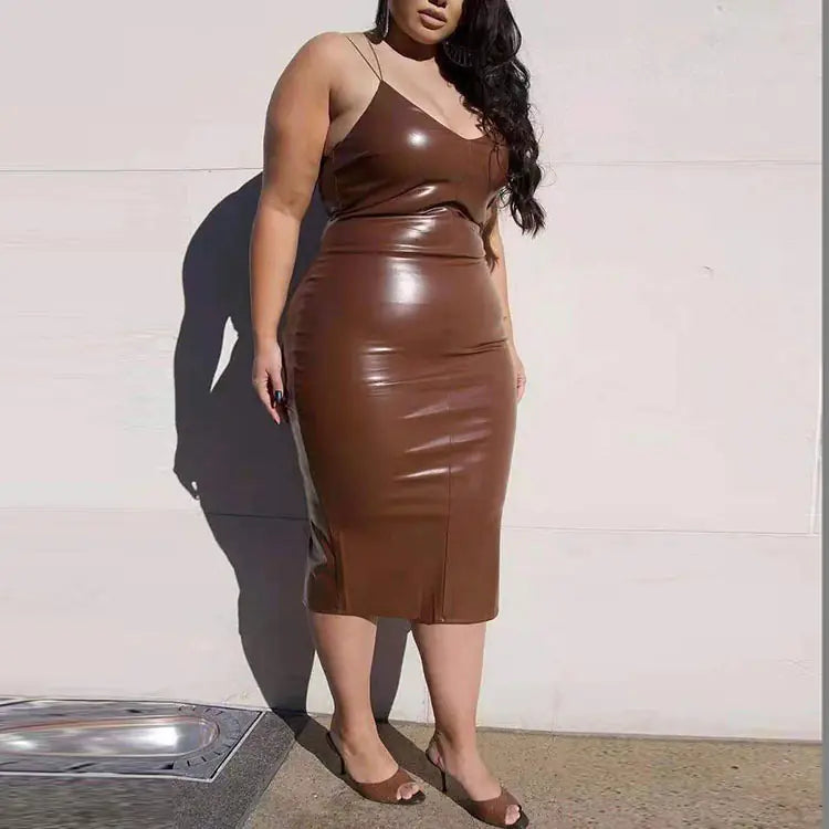 Plus size women's stylish autumn winter leather dress with a fitted silhouette and long sleeves, perfect for cold weather.