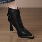 Women’s pointed-toe chunky-heel side-zip boots by FitiqueFit, featuring sleek black leather and stylish silhouette.