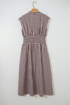 Threaded Pear Sarahi flare sleeveless maxi dress shown in flowing fabric with a fitted bodice and flared skirt.